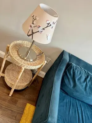 a table with a lamp next to a bed at 307 Kyoto style 1BDR Apt in center city in Philadelphia