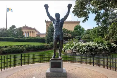 a statue of a man with his arms in the air at 307 Kyoto style 1BDR Apt in center city in Philadelphia