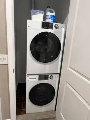a white washer and dryer in a room at 307 Kyoto style 1BDR Apt in center city in Philadelphia