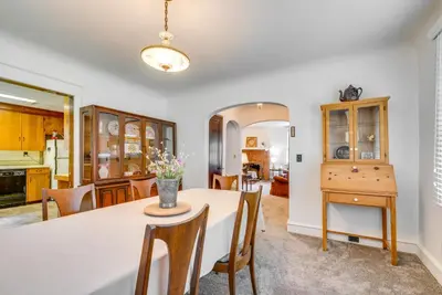 a kitchen and dining room with a table and chairs at 8 Mi to Elk Mountain Ski Resort Clifford Home! in Clifford