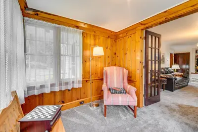 a living room with a chair and a couch at 8 Mi to Elk Mountain Ski Resort Clifford Home! in Clifford