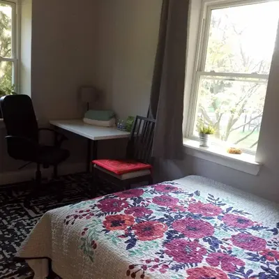 a bedroom with a bed and a window and a desk at Fairmount House Free Street Parking Quiet Spacious in Philadelphia