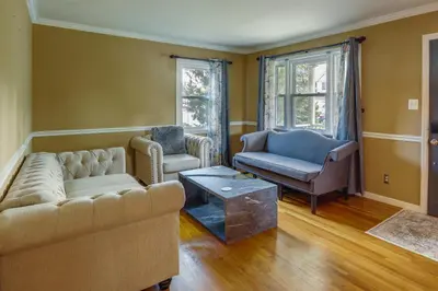 a living room with a couch and two chairs at Charming Monroe Township Home - 13 Mi to RU! in East Brunswick