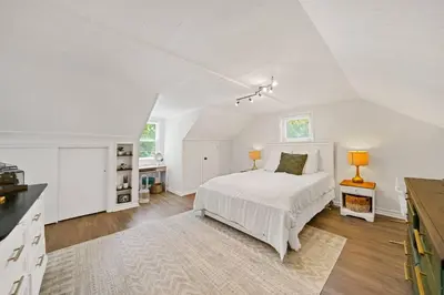 a white bedroom with a bed and a kitchen at 1255 Ashbridge, West Chester, PA in West Chester