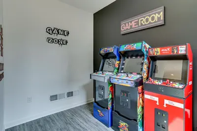 two arcade video game machines in a room at 3 Mi to Center City Philadelphia Townhome in Philadelphia