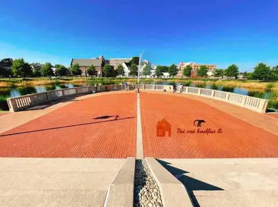a red brick walkway with a painting on it at THE ECO HOME. Entire place with private parking in Wilmington