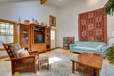 a living room with a couch and a table at Less Than 1 Mi to Camelback Resort Home with Pool Table! in Tannersville