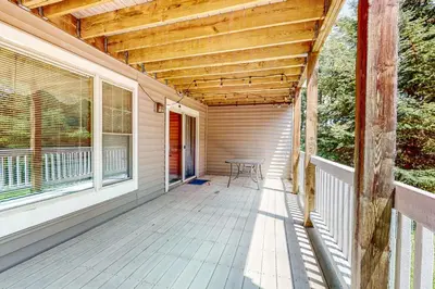 a porch of a house with a wooden roof at Maple Manor in Tannersville