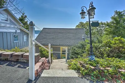 a street light in front of a house at Spacious Lakefront House With a Private Dock in Hopatcong