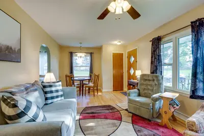 a living room with a couch and chairs and a table at Quaint Horseheads Home about 9 Mi to Elmira College in Horseheads