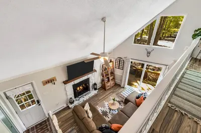 an overhead view of a living room with a fireplace at 3 bedroom Rental pet friendly, fireplace, hot tub, near ski resorts in Albrightsville