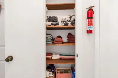 a closet with a fire hydrant sitting on a shelf at 3 bedroom Rental pet friendly, fireplace, hot tub, near ski resorts in Albrightsville