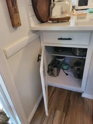 a kitchen counter with a white cabinet with a drawer at 3 bedroom Rental pet friendly, fireplace, hot tub, near ski resorts in Albrightsville