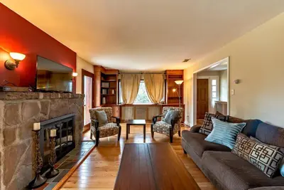 a living room with a couch and a fireplace at 5 Bdrm House (Sleeps 10) Horsham-Philadelphia in Horsham