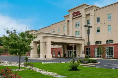 a rendering of a hotel with a building at Hampton Inn & Suites Wilmington Christiana in Newark