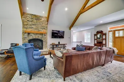 a living room with a couch and a fireplace at Cresco Countryside Oasis Surrounded by Nature! in Cresco