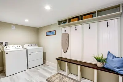 a laundry room with a washer and dryer at Beautiful Farmhouse close to Lanc Hershey Etown in Mount Joy
