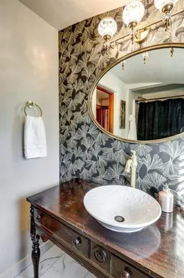 a bathroom with a sink and a mirror at The Conservatory-20 min to Lanc in Mount Joy