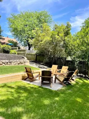 a group of chairs and a table in the grass at Victorian Manor on Main w 6 beds-10 mins to Lanc in Mountville