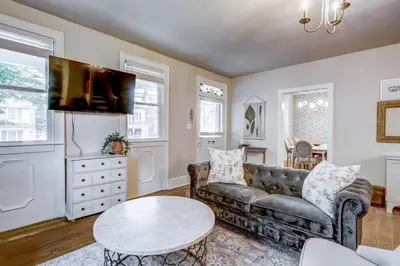 a living room with a couch and a table at Victorian Manor on Main w 6 beds-10 mins to Lanc in Mountville