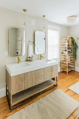 a bathroom with a sink and two mirrors at Quaint Boho Home in Lancaster City in Lancaster