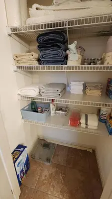 a refrigerator filled with lots of towels and towels at Entire townhouse close to Hershey Park in Enola