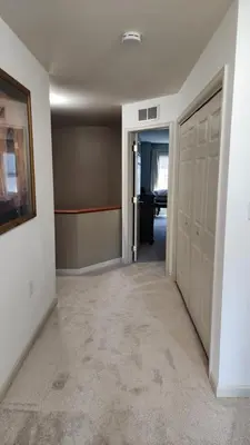 an empty hallway with two sets of doors in a house at Entire townhouse close to Hershey Park in Enola