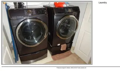 a washing machine and a washer in a room at Entire townhouse close to Hershey Park in Enola