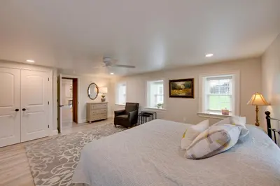 a bedroom with a bed and a living room at Patio and Yard Newly Built Retreat in Ronks! in Ronks