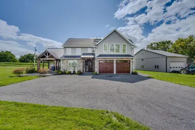a house with a driveway and a garage at Patio and Yard Newly Built Retreat in Ronks! in Ronks