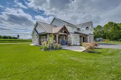 a house with a large yard with green grass at Patio and Yard Newly Built Retreat in Ronks! in Ronks