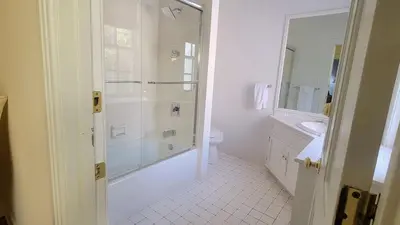 a bathroom with a shower and a toilet and a sink at Pinetown Bridge Bnb LLC in Leola
