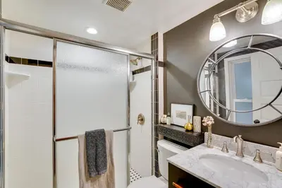 a bathroom with a sink and a mirror at Upper Black Eddy Home with Delaware River Access! in Upper Black Eddy