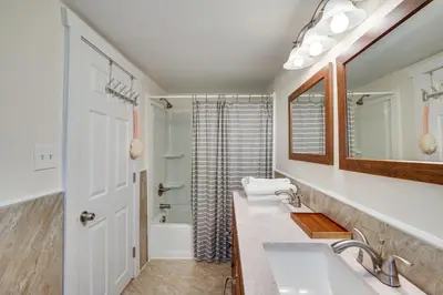 a bathroom with a sink and a mirror at Peaceful Upstate New York Home with Yard and Fire Pit! in Walden