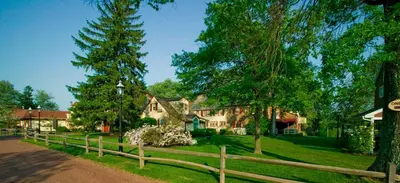 a wooden fence in front of a house at Joseph Ambler Inn in North Wales