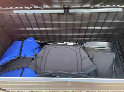 an open trunk of a car with blue and gray at Lakeside Oasis with Kayaks, Hot Tub, & Fire Pit in Clifton