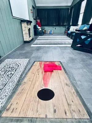 a wooden floor with a hole in the middle of a garage at Lakeside Oasis with Kayaks, Hot Tub, & Fire Pit in Clifton