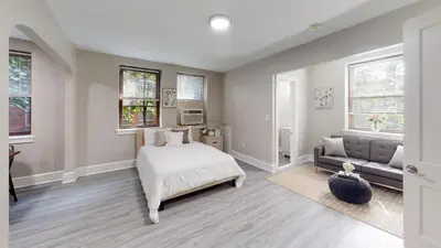 a bedroom with a bed and a couch at Lennox C101 Perfect & Peaceful Studio Apt in Philadelphia