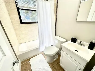 a bathroom with a toilet and a sink and a shower at Lennox C303 Peaceful, Perfect Private Studio1br in Philadelphia