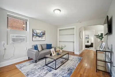 a living room with a couch and a table at Lennox C302 Peaceful & Perfect Private 1Br in Philadelphia