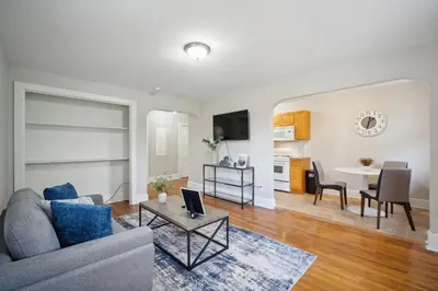 a living room with a couch and a table at Lennox C302 Peaceful & Perfect Private 1Br in Philadelphia