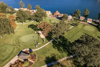 an aerial view of a golf course with the ocean at Lakefront Home at Lake Winola, PA in Factoryville
