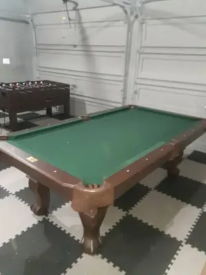 a green snooker table in a room at Stunning Lakefront Home - Swim, Fish, Kayak, HotTub in Long Pond