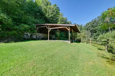 a wooden pavilion in the middle of a field at Rustic Bainbridge Retreat with Spacious Yard! in Bainbridge