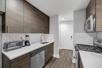 a kitchen with a sink and a stove at Avenue A821 I Cozy and Comfy Philadelphia stay in Philadelphia