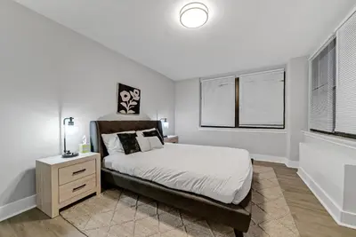 a white bedroom with a bed and a window at Avenue A821 I Cozy and Comfy Philadelphia stay in Philadelphia