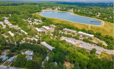 an aerial view of a park with a lake at pb 1112 Furnished 2br with Parking, gym, in Newark