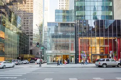 a busy city street with cars and people crossing the street at Midtown 2br w doorman wd nr Central Park NYC-1246 in New York