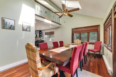 a dining room with a table and chairs at Pocono Pines Gem with Fire Pit and On-Site Creek! in Pocono Pines