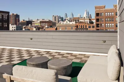 a balcony with a view of a city skyline at Sosuite at The Vine - Old City in Philadelphia